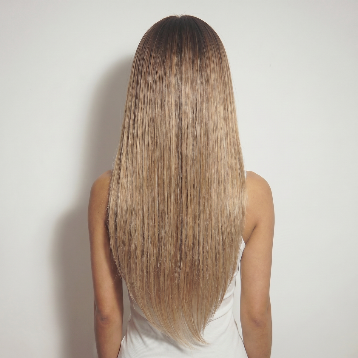 WIGZ 17 - Full back view of 24 inch 200% density STRAIGHT ROOTED BLONDE wig.