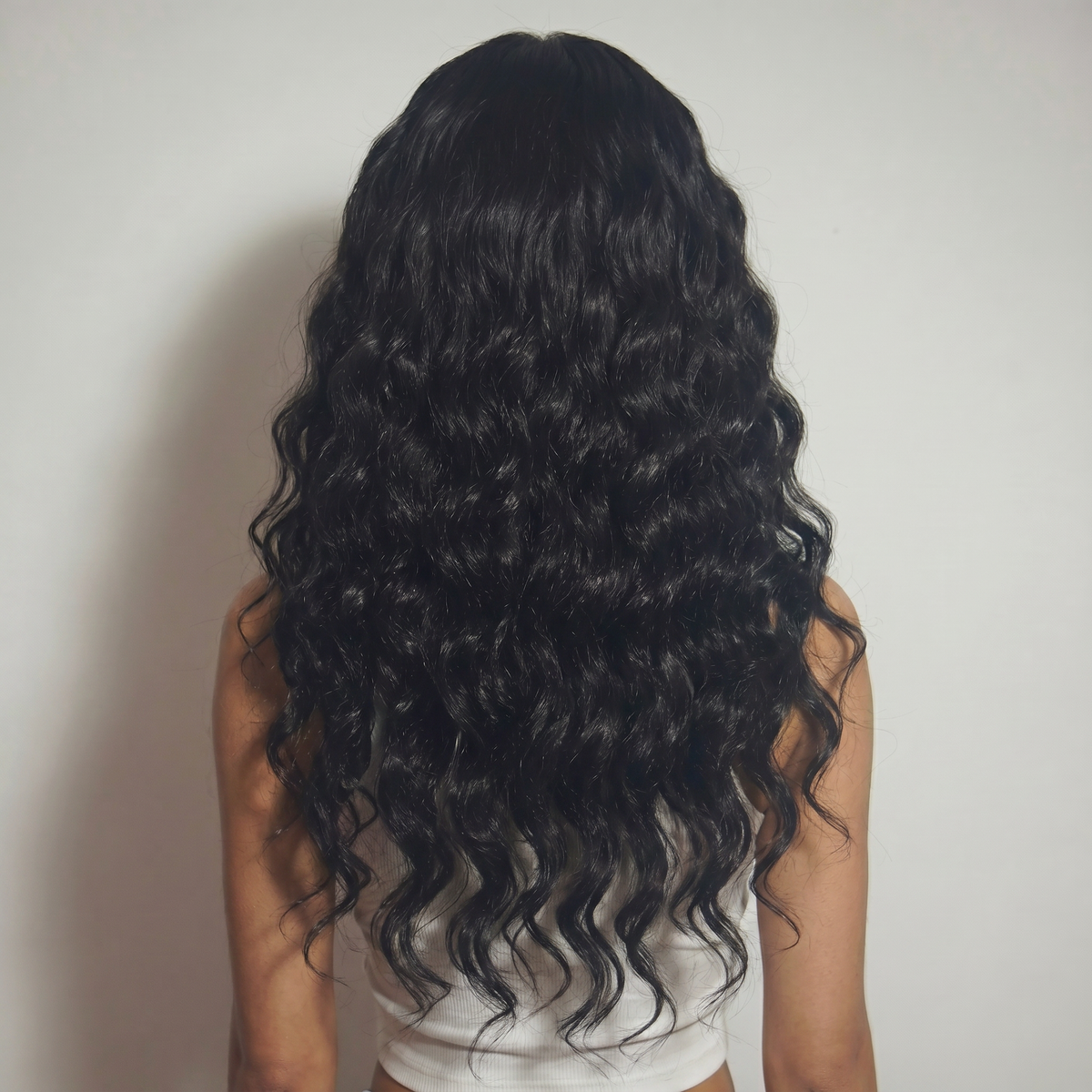 WIGZ 34 - Full back view of 28 inch 180% density WAVY JET BLACK wig.