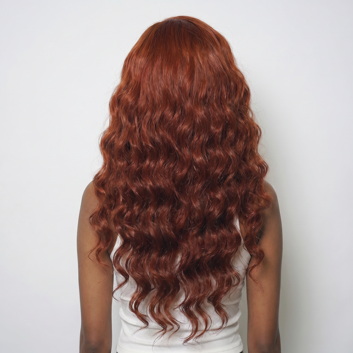 WIGZ 36 - Full back view of 26 inch 200% density WAVY AUBURN wig.
