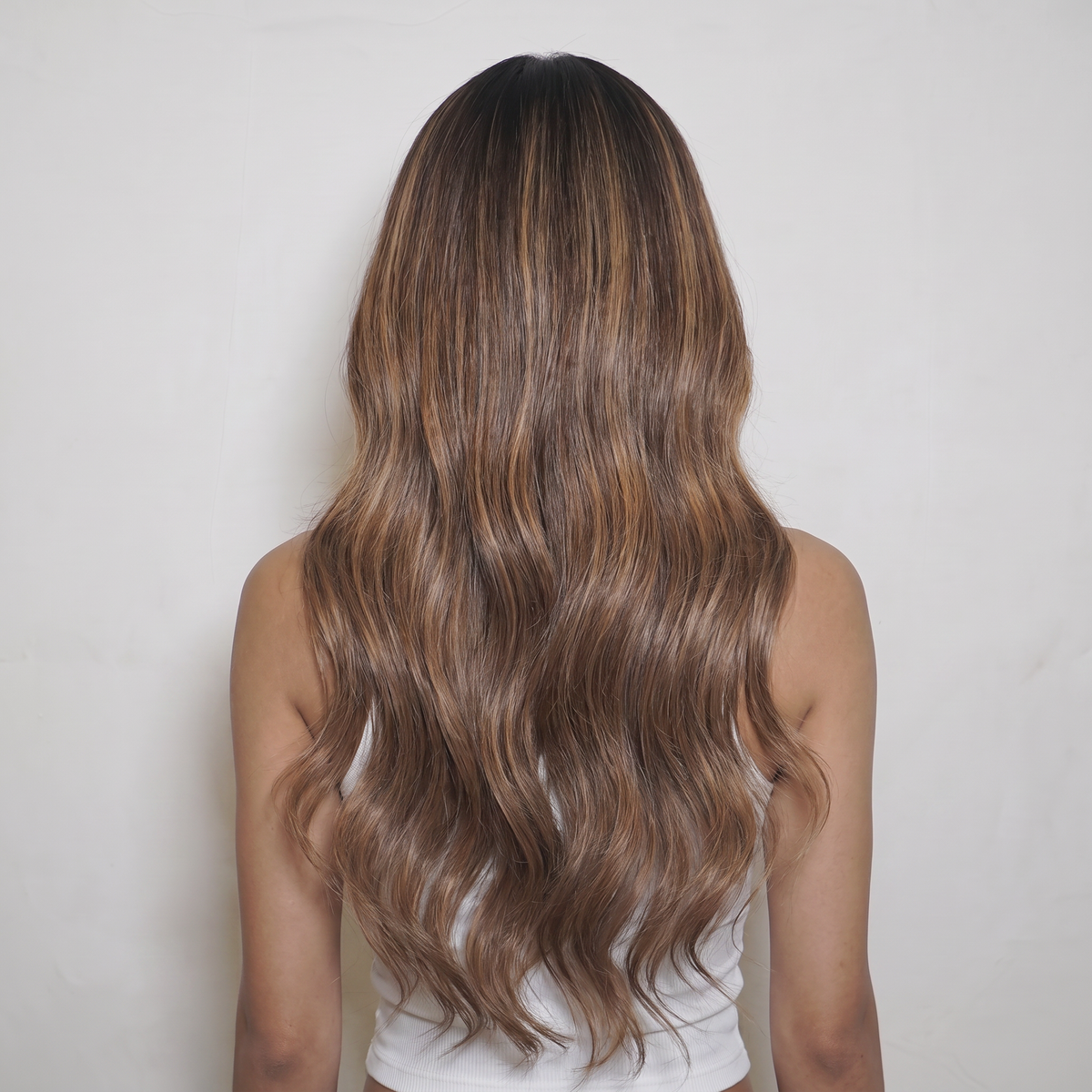 WIGZ 43 - Full back view of 24 inch 180% density WAVY HONEY BALAYAGE wig.