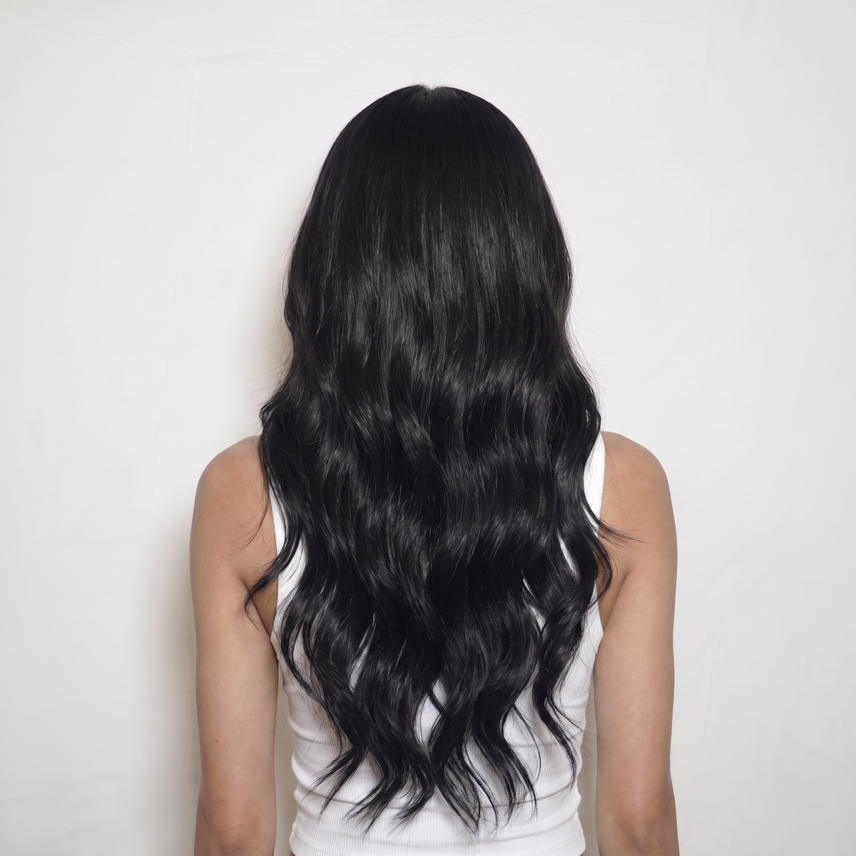 WIGZ 46 - Full back view of 24 inch 180% density WAVY JET BLACK wig.