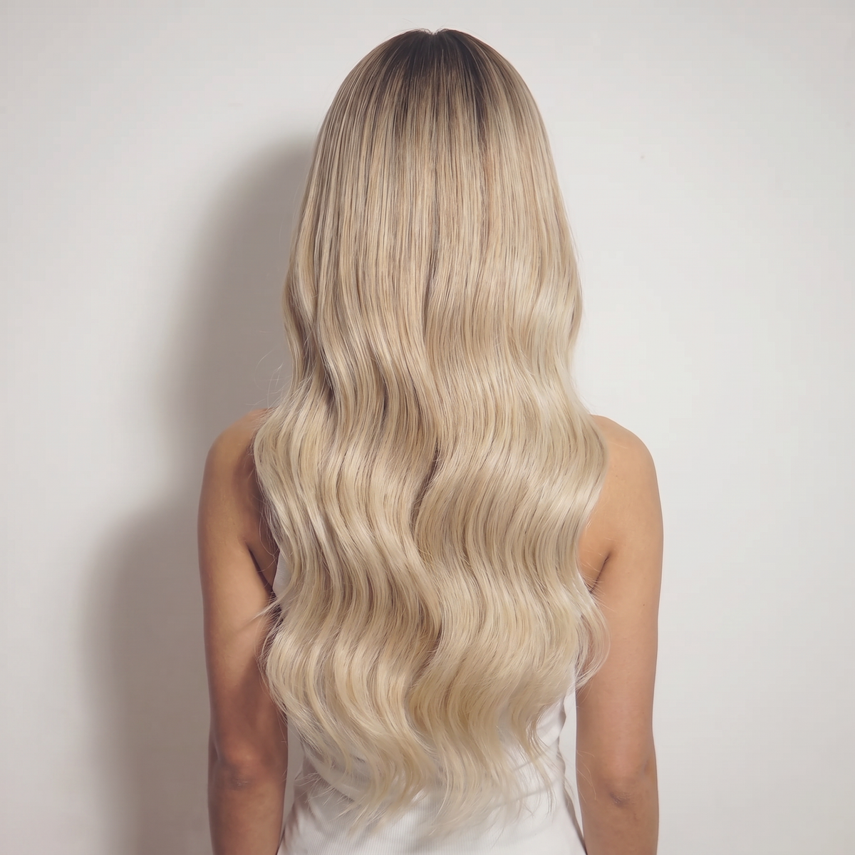 WIGZ 51 - Full back view of 24 inch 180% density WAVY BEIGE BLONDE BALAYAGE wig.