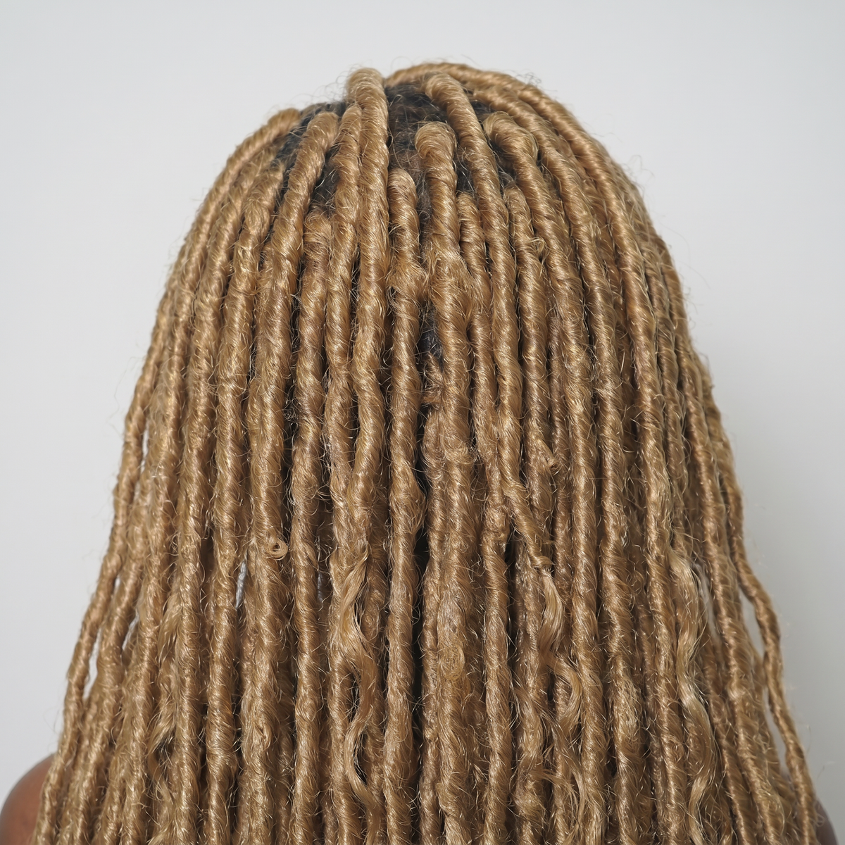 WIGZ 04 - Macro close-up of AFRO ROOTED BLONDE LOCS PURE-VIRGIN HAIR™ texture and shine.