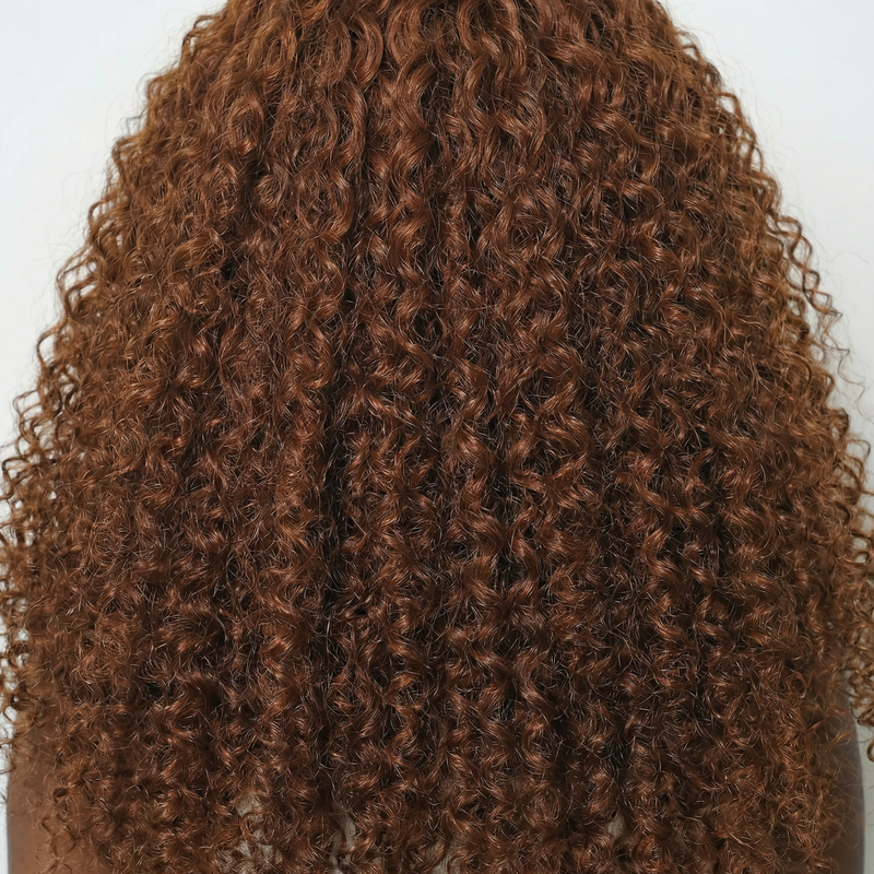 WIGZ 09 - Macro close-up of CURLY COPPER BROWN PURE-VIRGIN HAIR™ texture and shine.