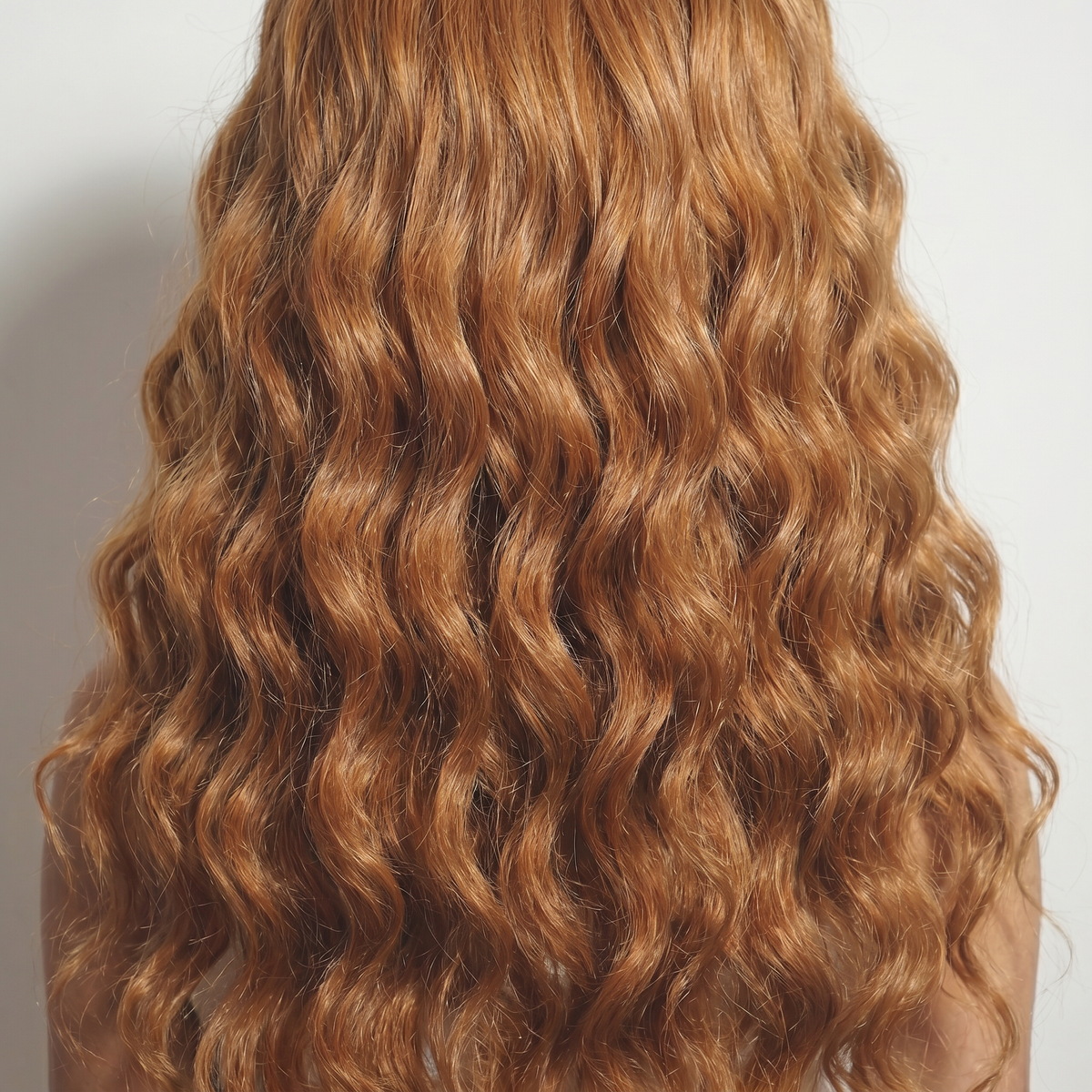 WIGZ 47 - Macro close-up of DEEP WAVY COPPER BROWN PURE-VIRGIN HAIR™ texture and shine.