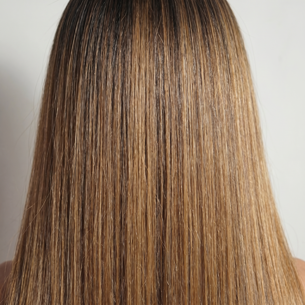 WIGZ 13 - Macro close-up of STRAIGHT ROOTED HONEY PURE-VIRGIN HAIR™ texture and shine.