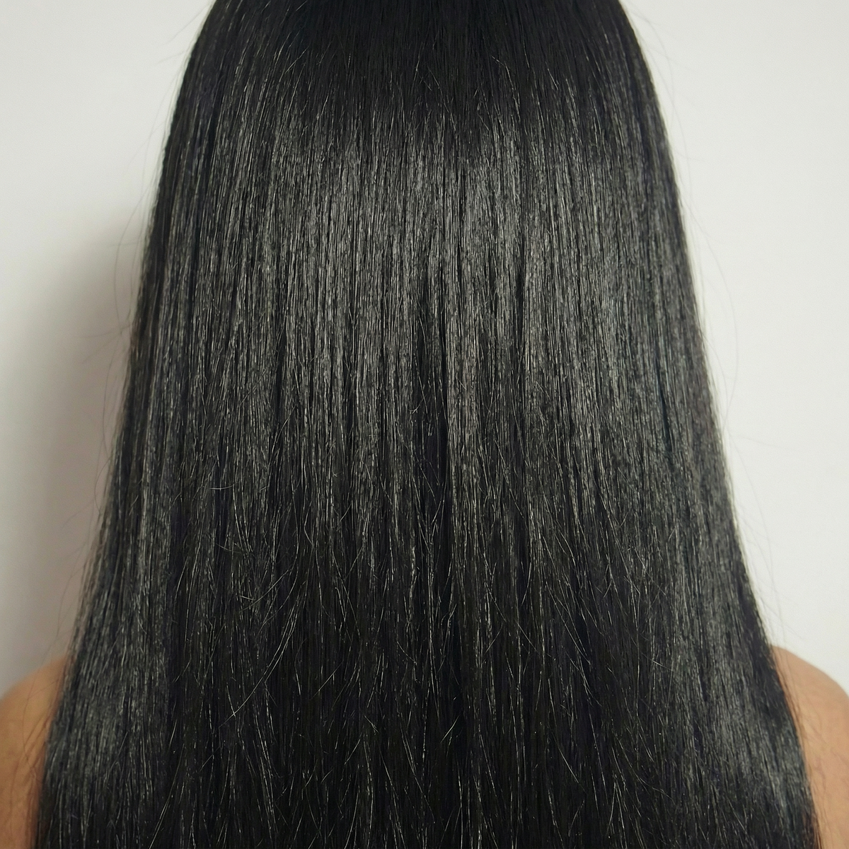 WIGZ 18 - Macro close-up of STRAIGHT BLACK PURE-VIRGIN HAIR™ texture and shine.