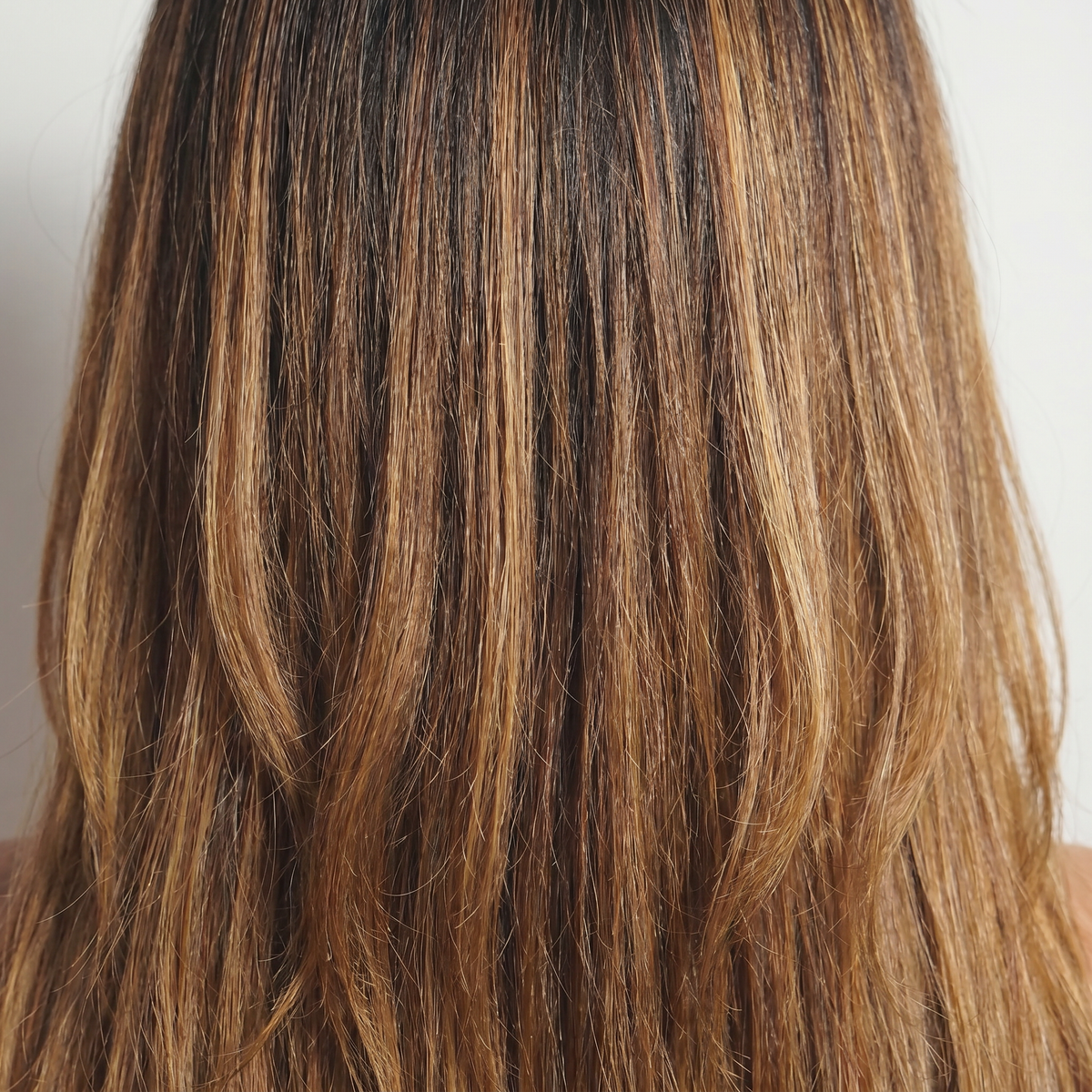 WIGZ 24 - Macro close-up of STRAIGHT COFFEE BALAYAGE PURE-VIRGIN HAIR™ texture and shine.