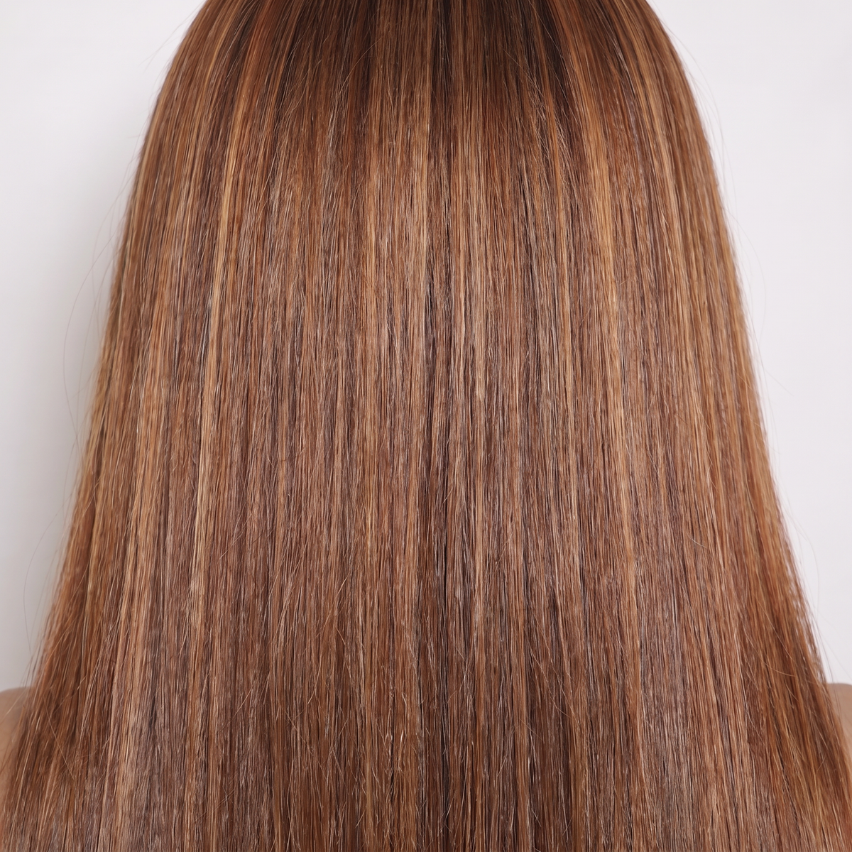 WIGZ 39 - Macro close-up of STRAIGHT AUBURN HIGHLIGHTS PURE-VIRGIN HAIR™ texture and shine.