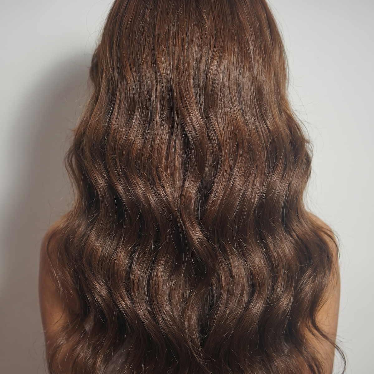 WIGZ 27 - Macro close-up of WAVY ESPRESSO PURE-VIRGIN HAIR™ texture and shine.