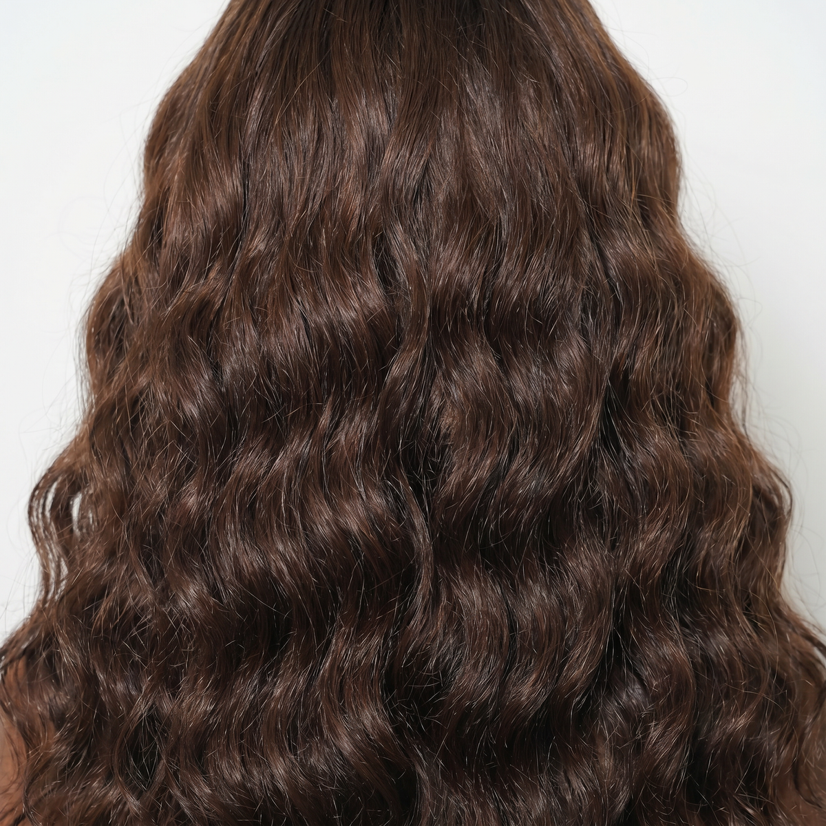 WIGZ 35 - Macro close-up of WAVY MOCHA PURE-VIRGIN HAIR™ texture and shine.