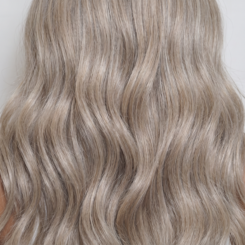 WIGZ 44 - Macro close-up of WAVY ASH BLONDE PURE-VIRGIN HAIR™ texture and shine.