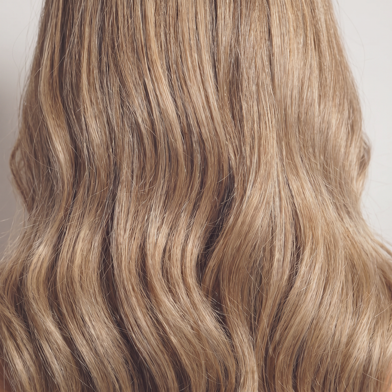 WIGZ 52 - Macro close-up of WAVY HONEY BLONDE BALAYAGE PURE-VIRGIN HAIR™ texture and shine.