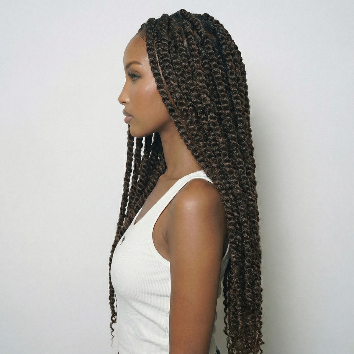 WIGZ 05 - Side profile view of layered AFRO PASSION TWISTS virgin hair wig with WIGZ LAB CAP™.
