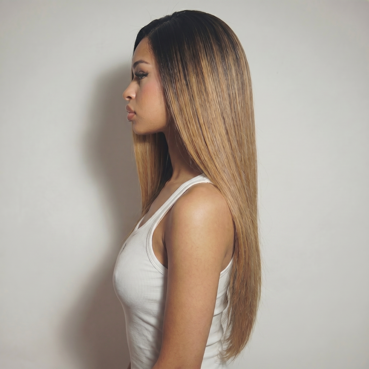 WIGZ 13 - Side profile view of layered STRAIGHT ROOTED HONEY virgin hair wig with WIGZ LAB CAP™.