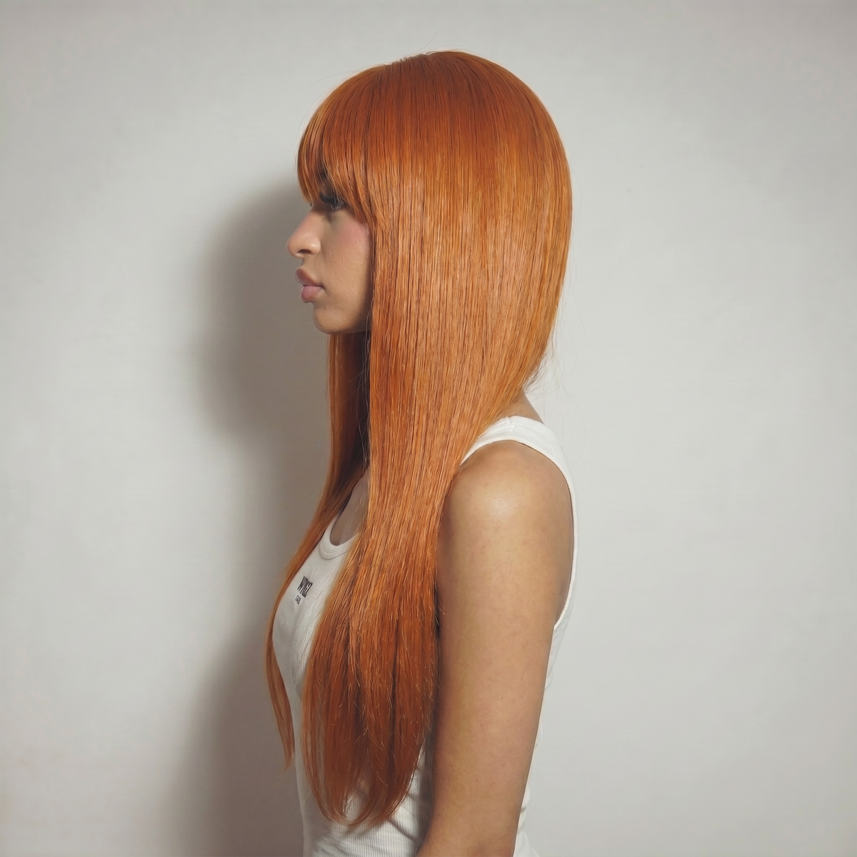 WIGZ 19 - Side profile view of layered STRAIGHT GINGER virgin hair wig with WIGZ LAB CAP™.
