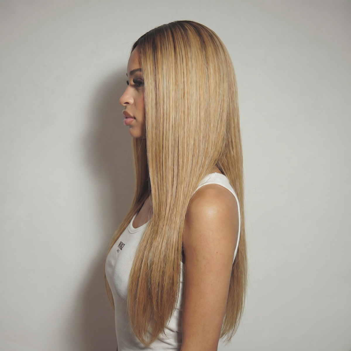 WIGZ 21 - Side profile view of layered STRAIGHT ROOTED BLOND virgin hair wig with WIGZ LAB CAP™.