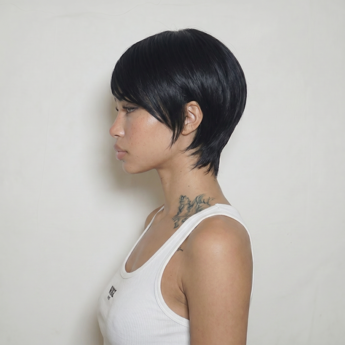 WIGZ 22 - Side profile view of layered STRAIGHT OFF BLACK virgin hair wig with WIGZ LAB CAP™.