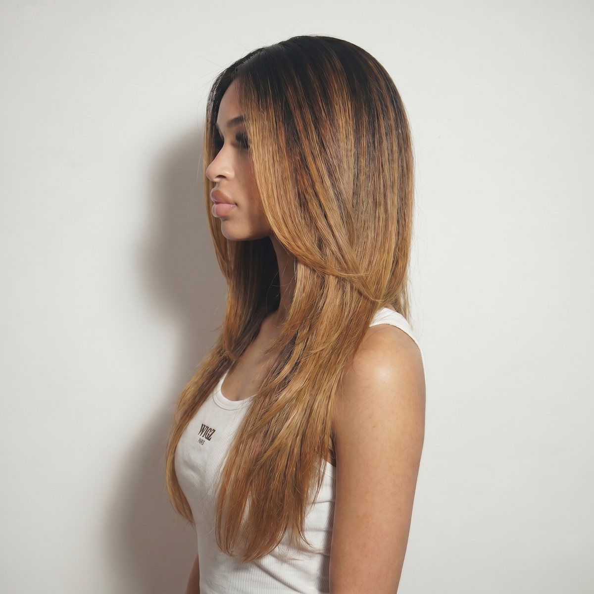 WIGZ 24 - Side profile view of layered STRAIGHT COFFEE BALAYAGE virgin hair wig with WIGZ LAB CAP™.