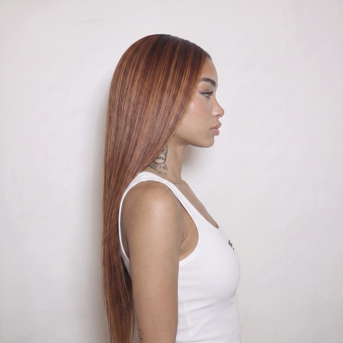WIGZ 39 - Side profile view of layered STRAIGHT AUBURN HIGHLIGHTS virgin hair wig with WIGZ LAB CAP™.