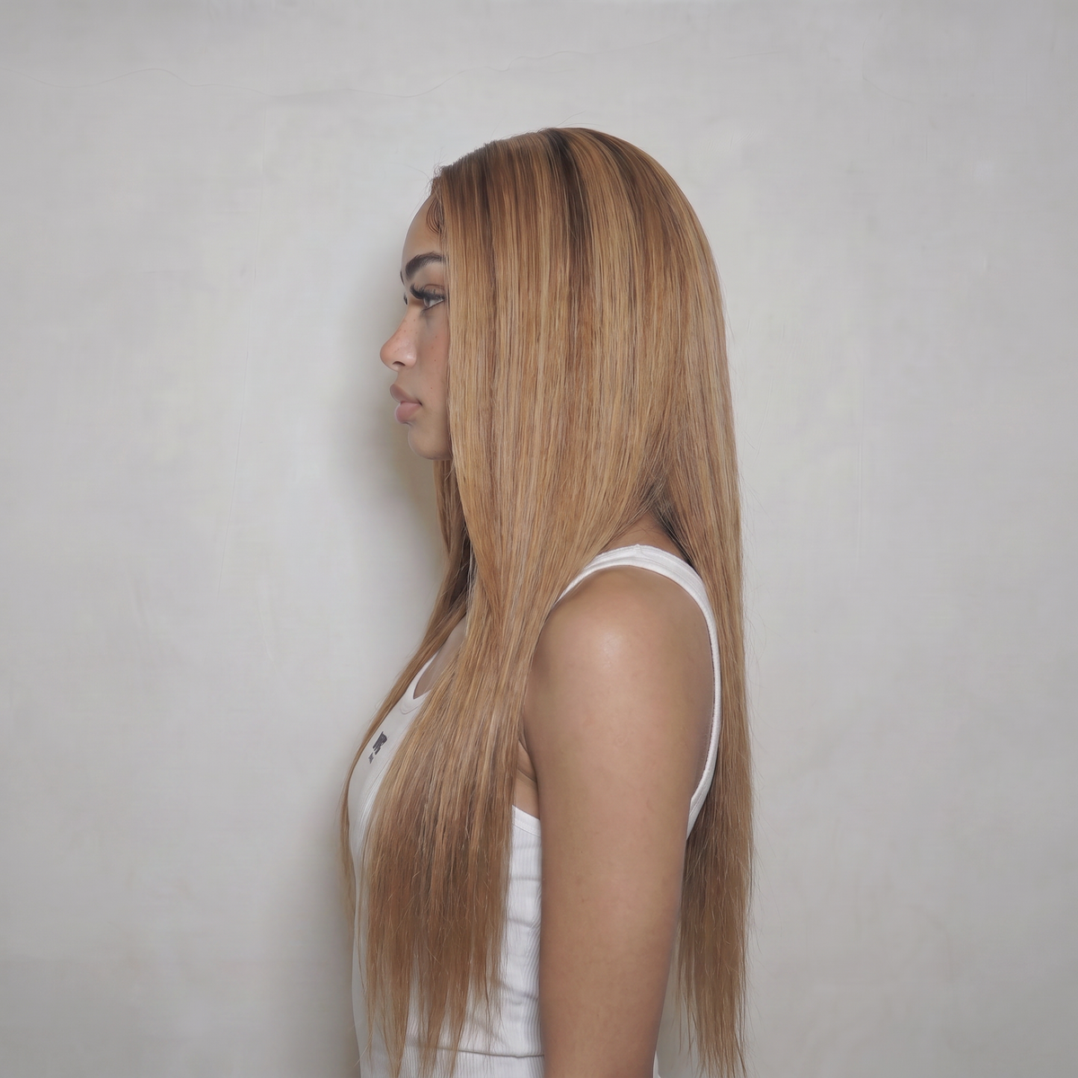 WIGZ 41 - Side profile view of layered STRAIGHT WARM GINGER BLONDE virgin hair wig with WIGZ LAB CAP™.