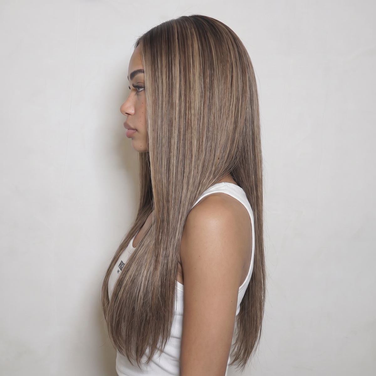 WIGZ 45 - Side profile view of layered STRAIGHT ASH BROWN BALAYAGE virgin hair wig with WIGZ LAB CAP™.