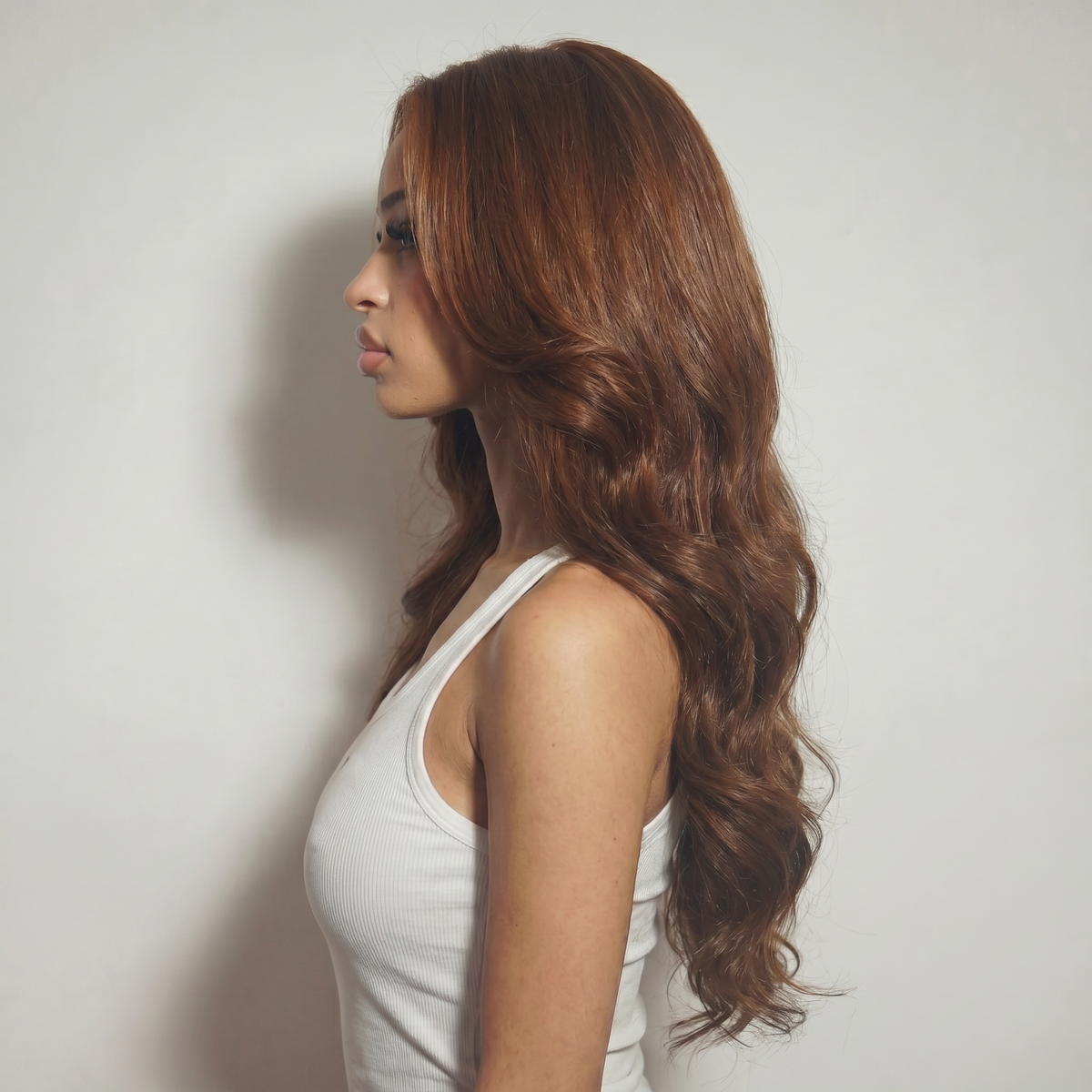 WIGZ 48 - Side profile view of layered WAVY WARM BROWN virgin hair wig with WIGZ LAB CAP™.