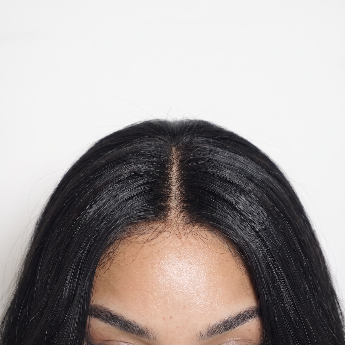 WIGZ 46 - Close-up of undetectable WIGZ LAB HD LACE™ skin-melt parting.