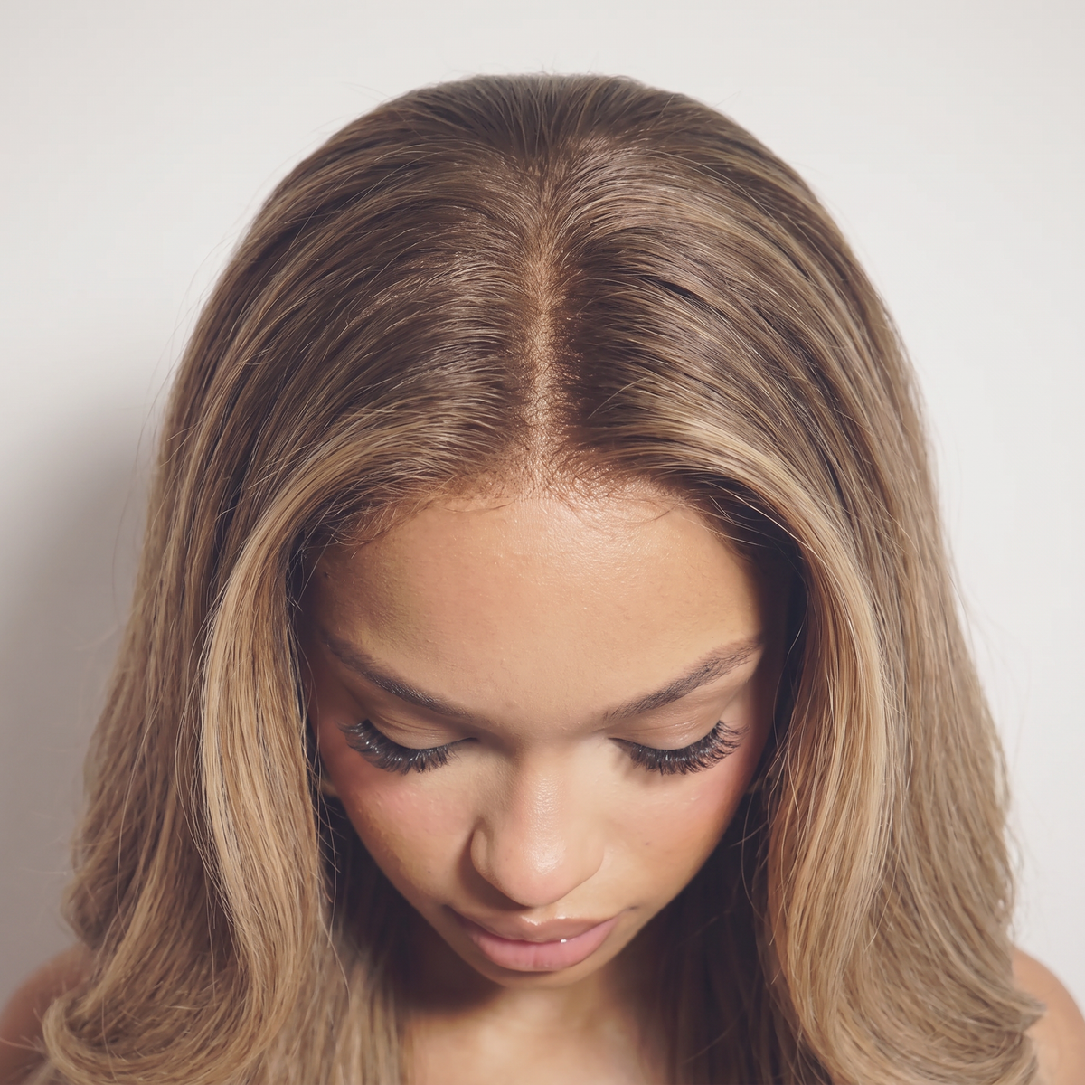 WIGZ 52 - Close-up of undetectable WIGZ LAB HD LACE™ skin-melt parting.